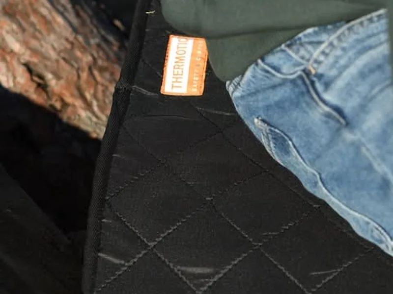 Thermotic sittvärmeskydd som används utomhus